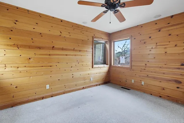 a view of an empty room and window