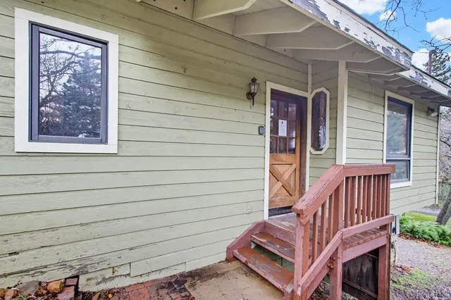 a view of wooden bench in balcony