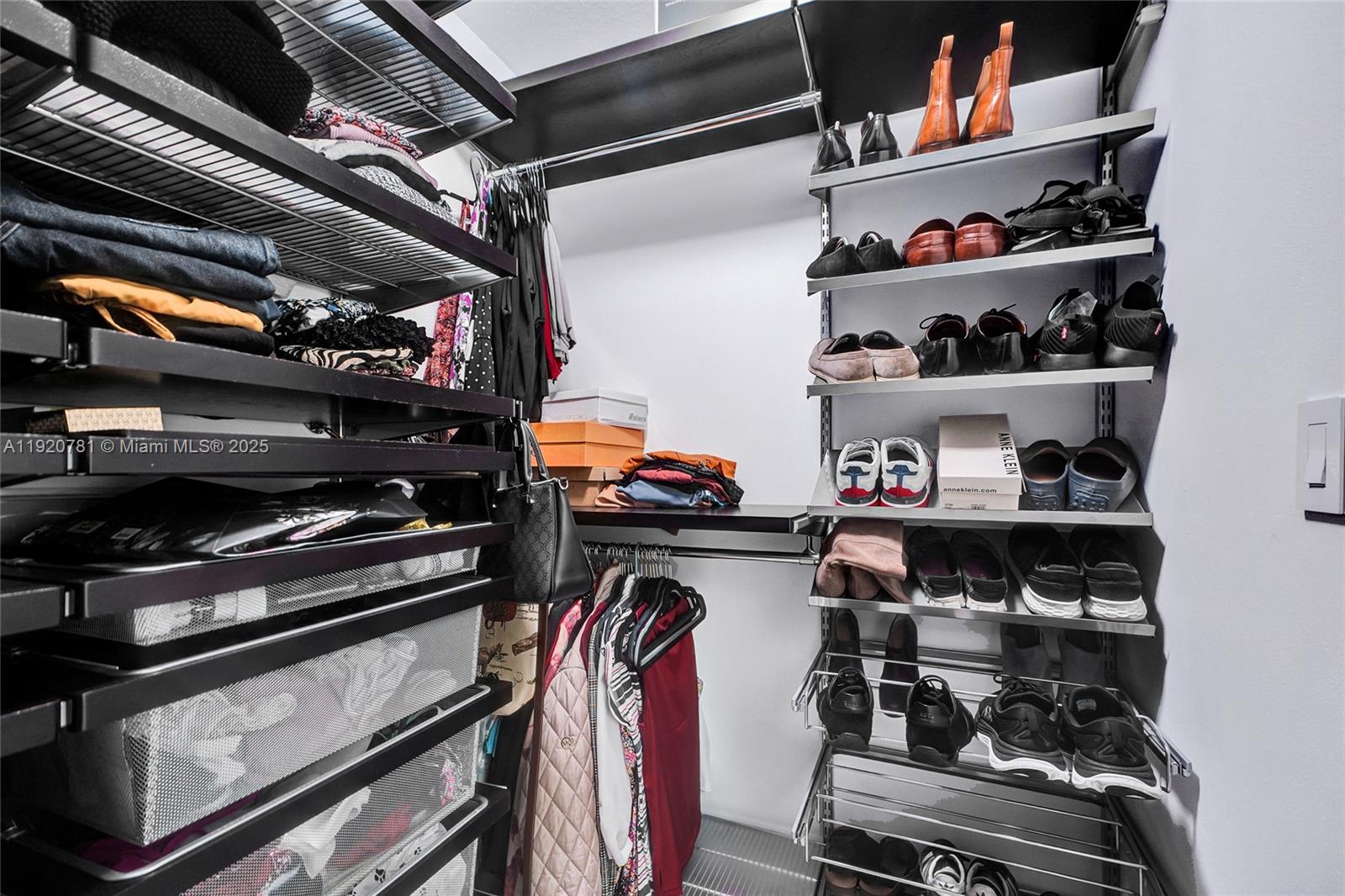377 Northeast 194th Terrace Miami, FL 33179 - Photo 11 of 19 a storage room with stainless steel appliances and cabinets