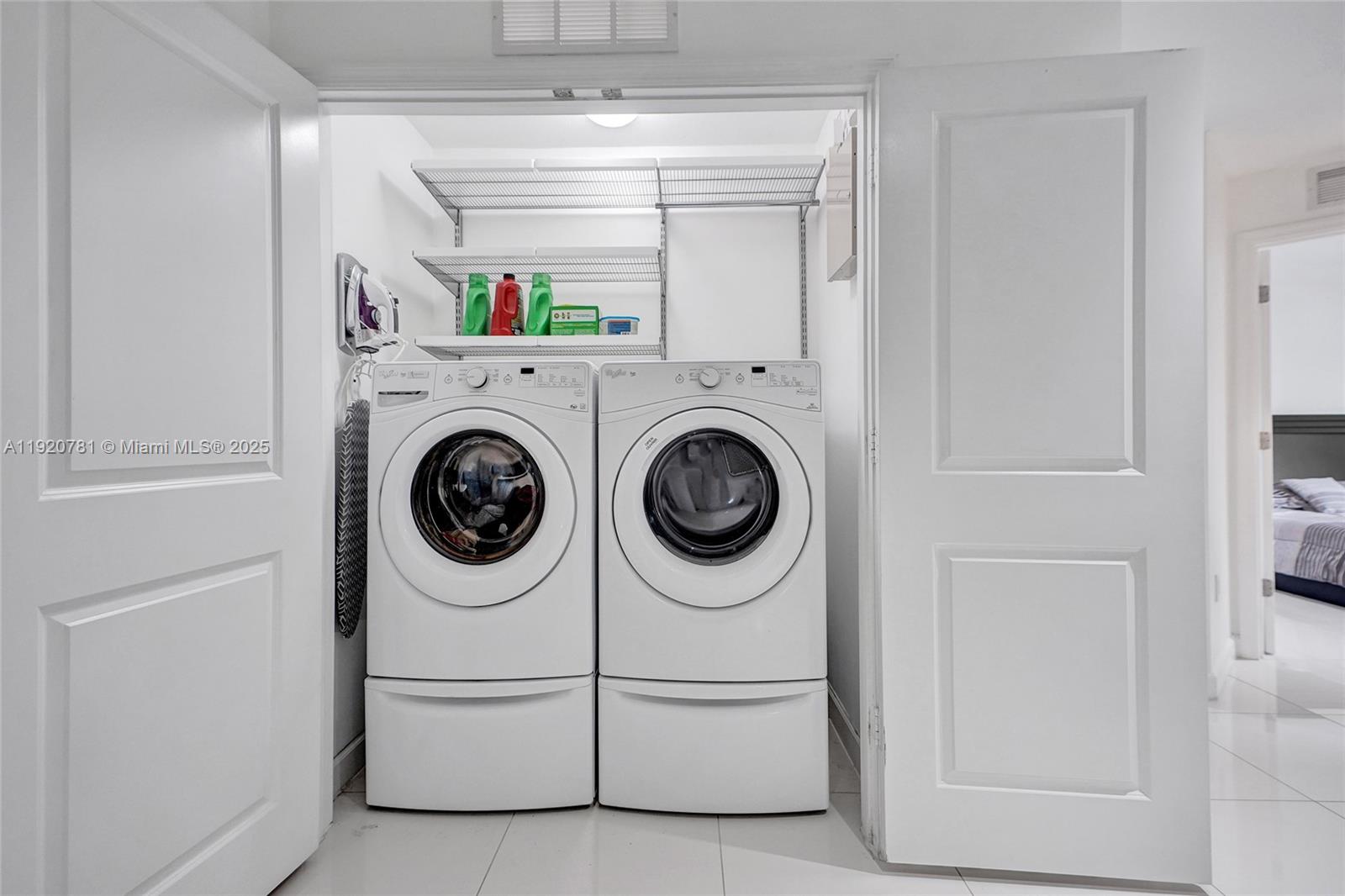 377 Northeast 194th Terrace Miami, FL 33179 - Photo 13 of 19 a utility room with dryer and washer