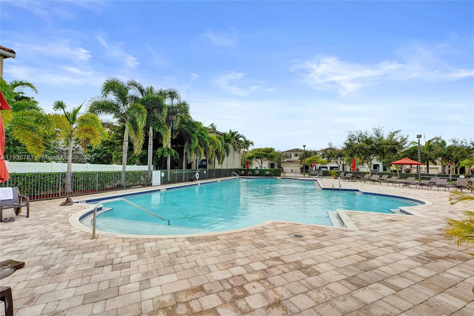 377 Northeast 194th Terrace Miami, FL 33179 - Photo 18 of 19 a view of a swimming pool with an outdoor seating