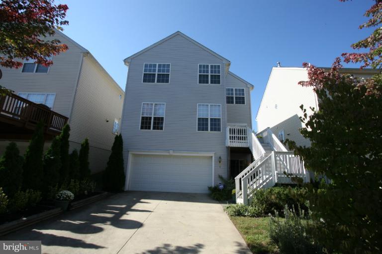 18117 Coachmans Road Germantown, MD 20874 - Photo 24 of 30 Rear view of home- 2 car garage