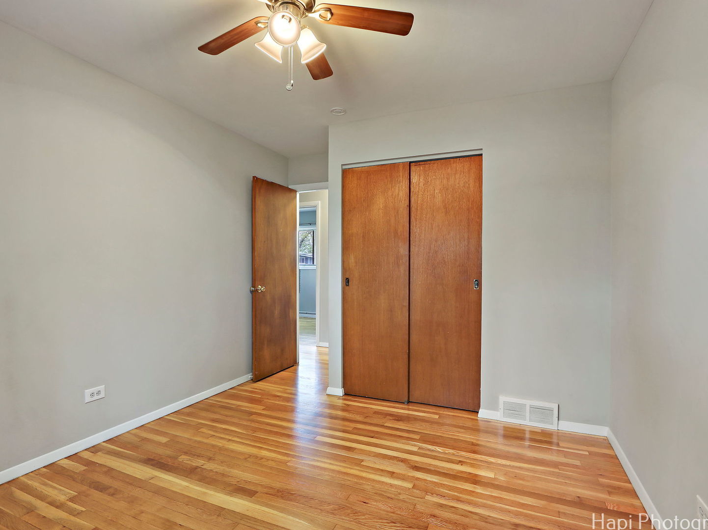 1291 Banbury Road Mundelein, IL 60060 - Photo 12 of 22 a view of an empty room with wooden floor