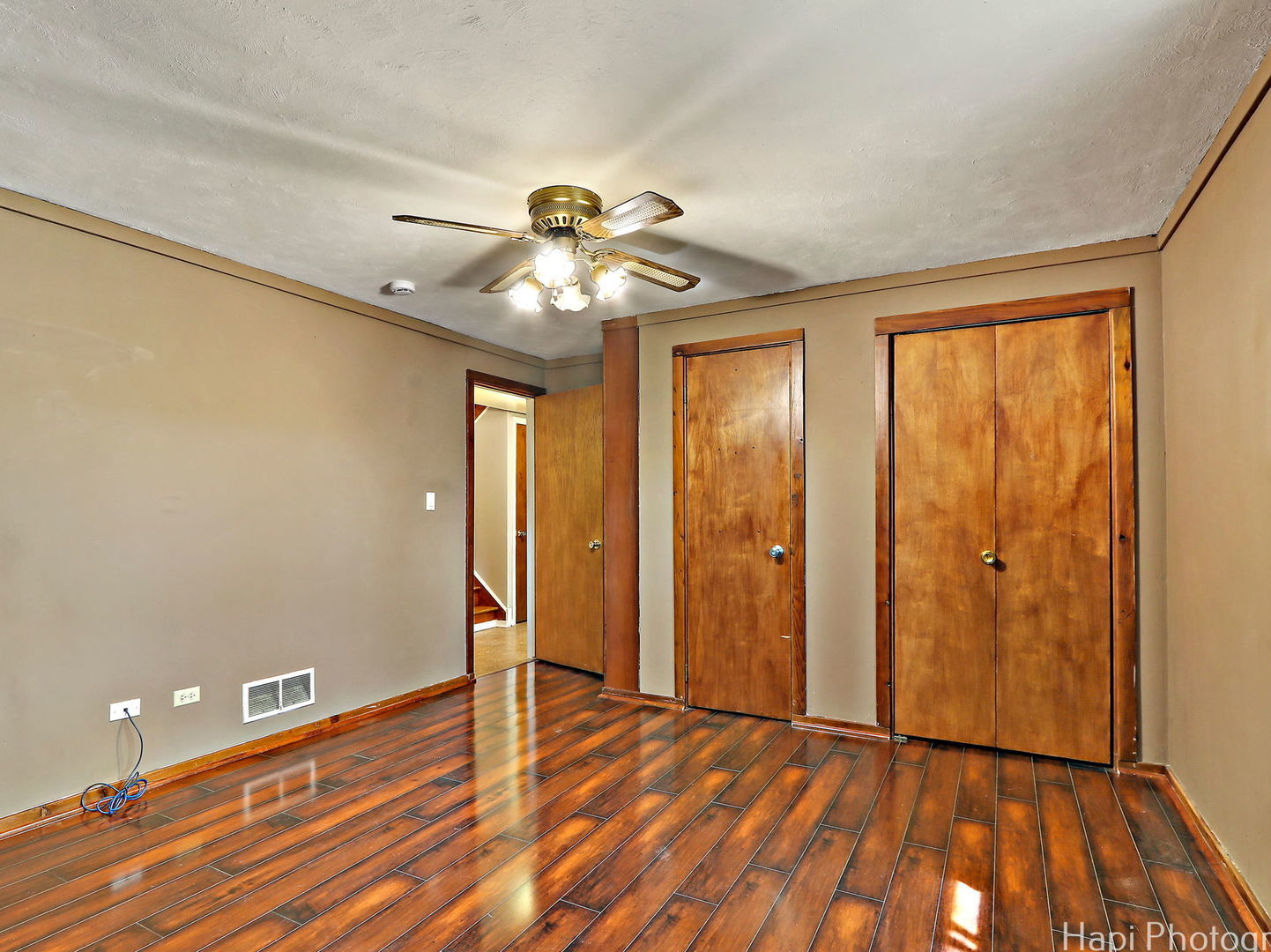 1291 Banbury Road Mundelein, IL 60060 - Photo 18 of 22 wooden floor in an empty room with a window
