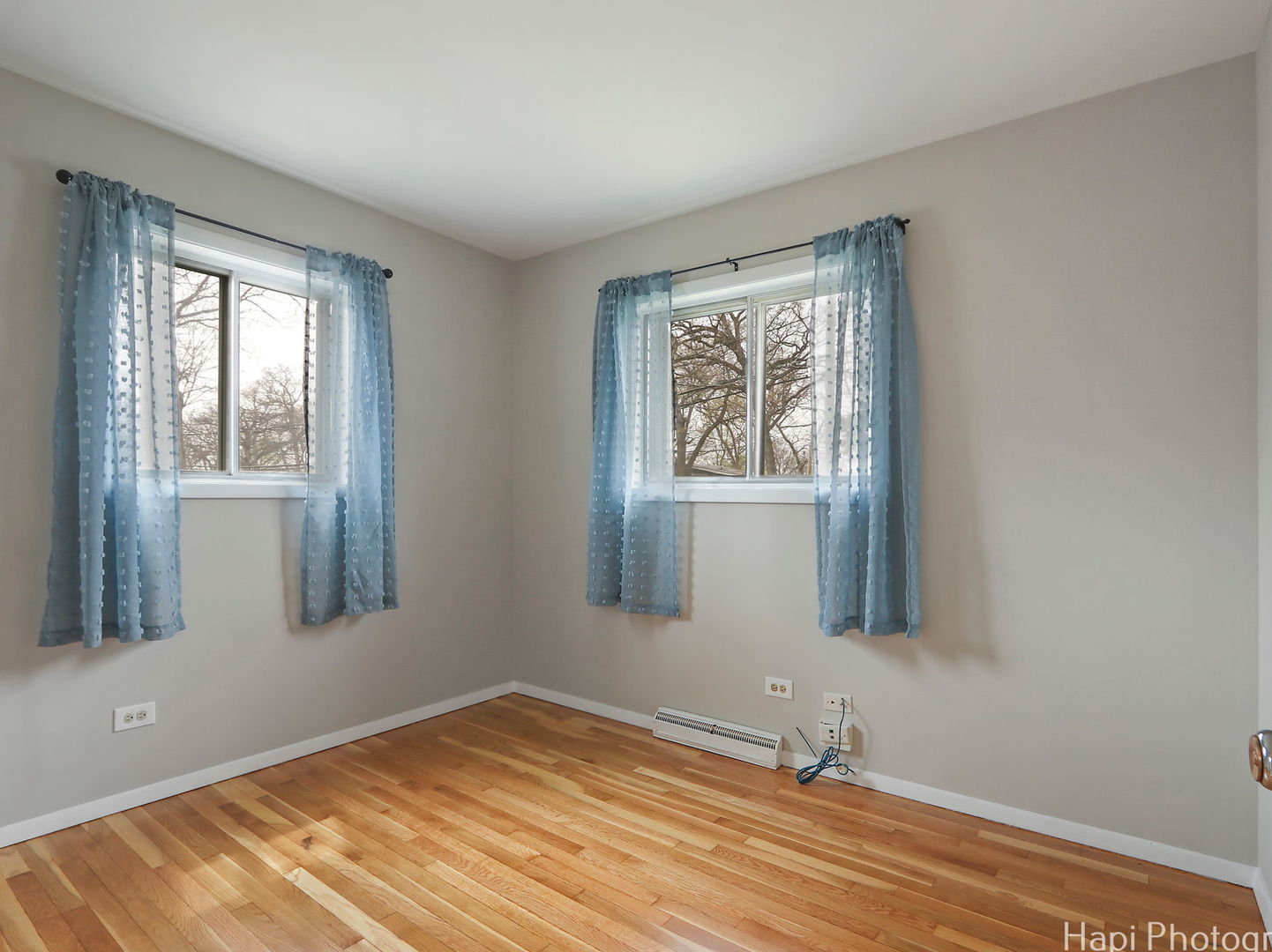 1291 Banbury Road Mundelein, IL 60060 - Photo 9 of 22 a view of an empty room with wooden floor and a window