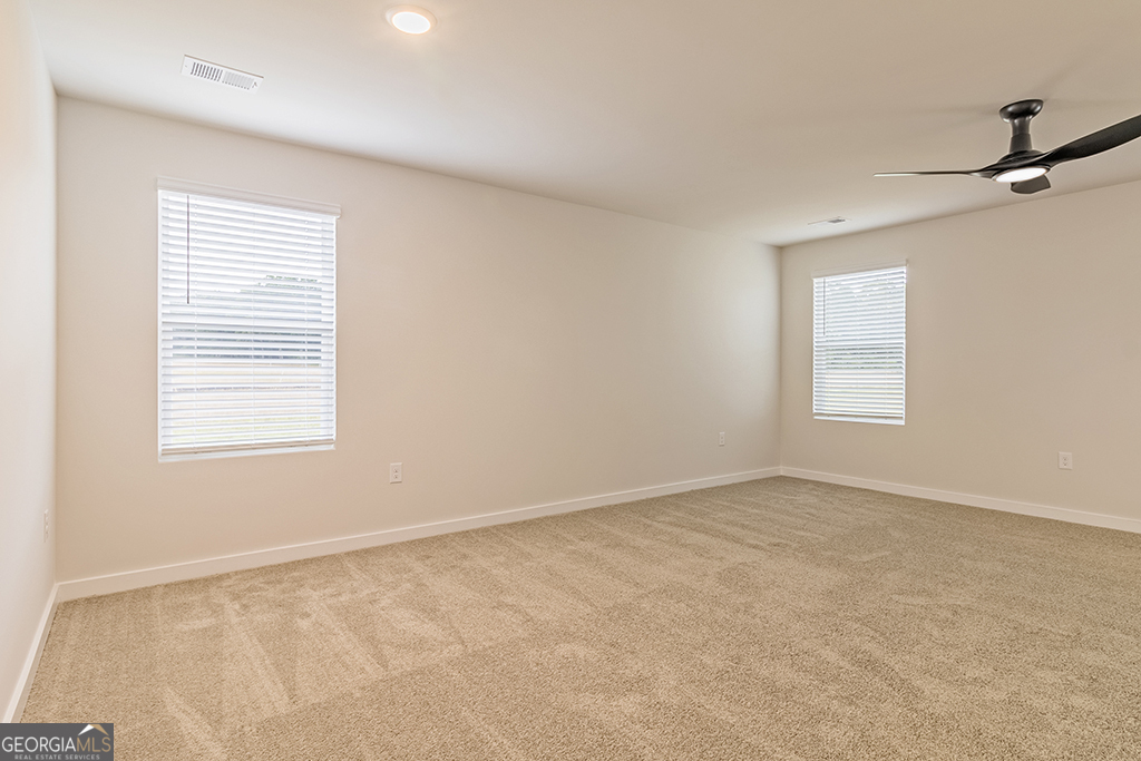 342 Jarrett Street Fairburn, GA 30213 - Photo 7 of 34