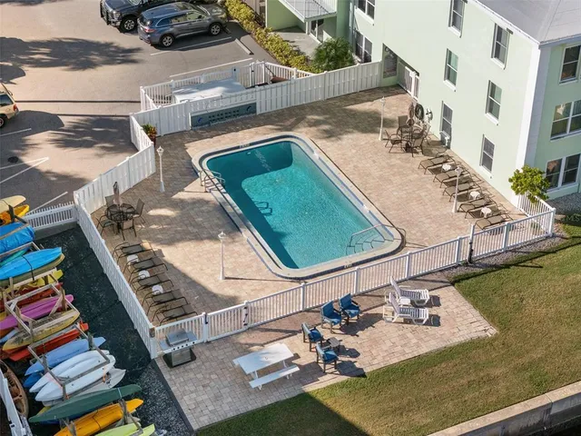an aerial view of a house with a ocean view