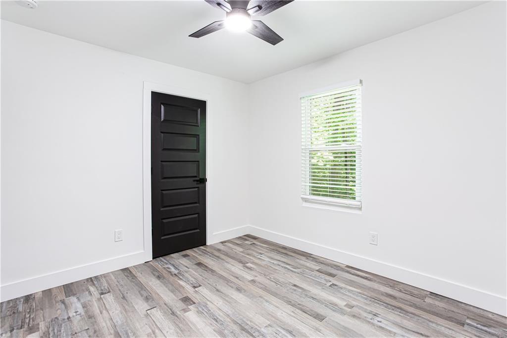 3038 Sutter Court Southwest Snellville, GA 30039 - Photo 11 of 22 a view of an empty room with a window and closet