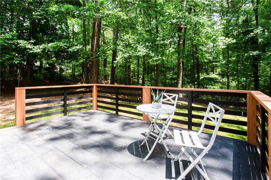 3038 Sutter Court Southwest Snellville, GA 30039 - Photo 19 of 22 a view of an outdoor sitting area with chairs