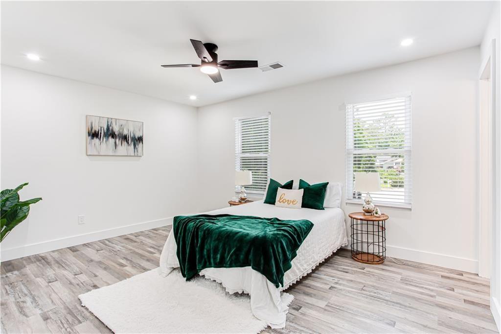 3038 Sutter Court Southwest Snellville, GA 30039 - Photo 7 of 22 a bedroom with a large bed and a window