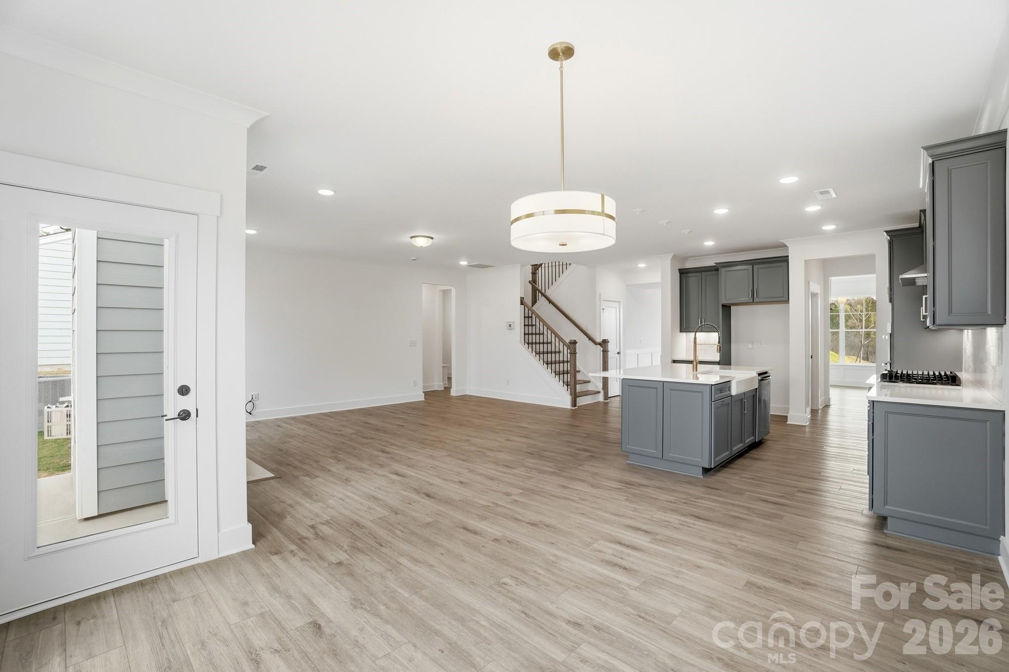 115 Longwood Road Mooresville, NC 28115 - Photo 15 of 43 a view of kitchen with microwave and stove