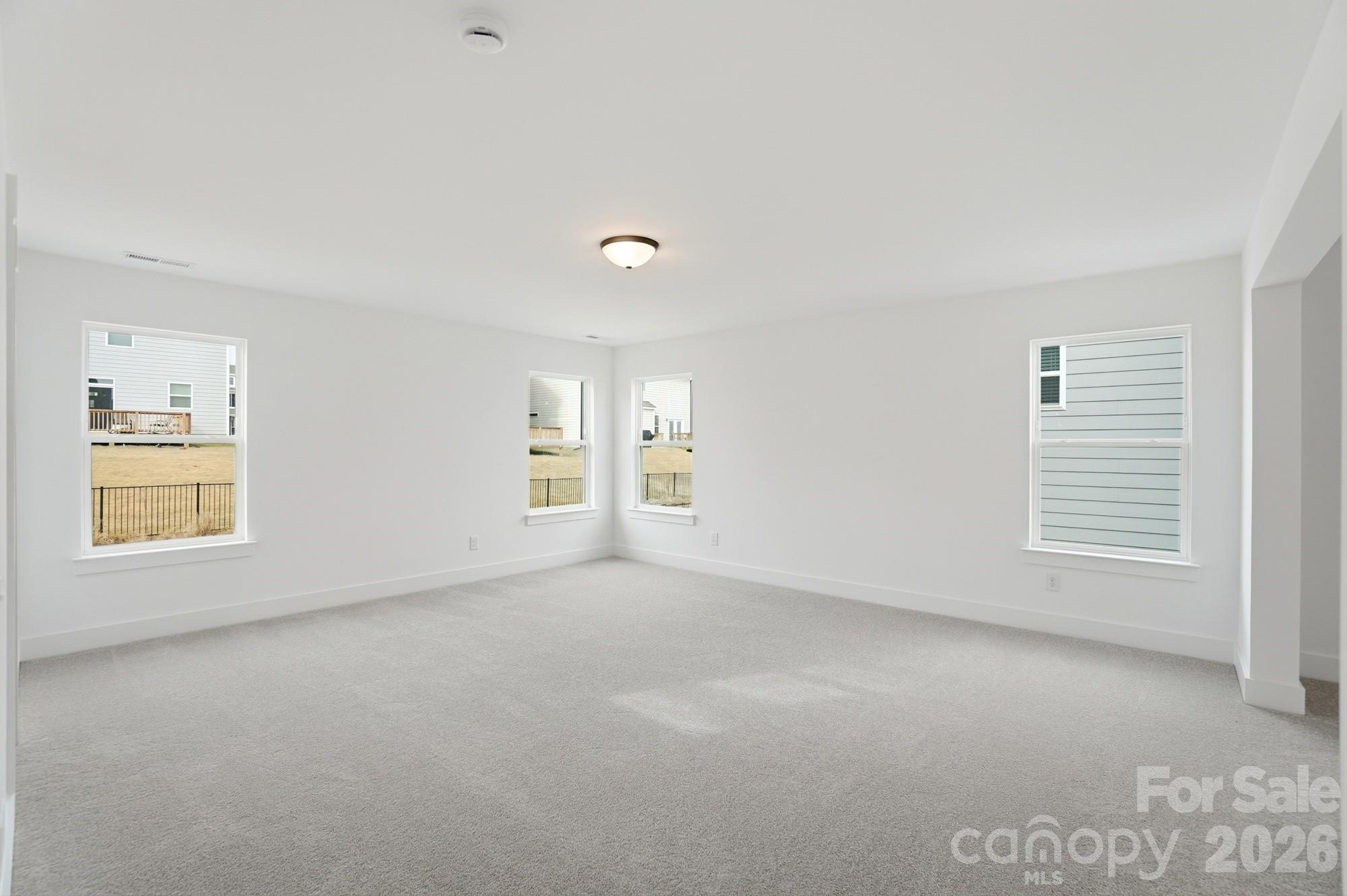 115 Longwood Road Mooresville, NC 28115 - Photo 27 of 43 a view of an empty room with a window