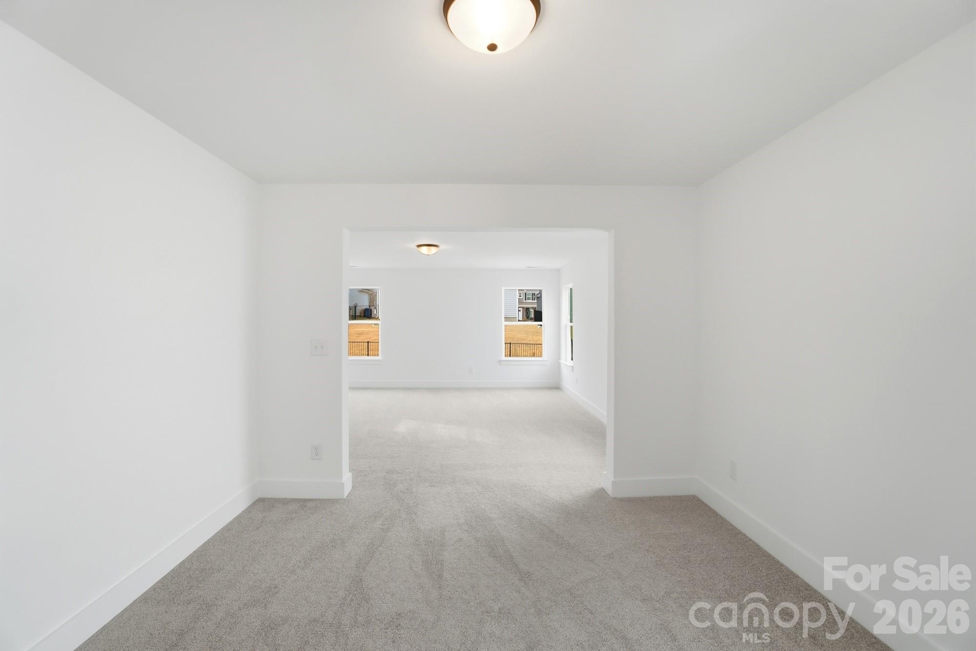 115 Longwood Road Mooresville, NC 28115 - Photo 30 of 43 a view of a livingroom and a car parked