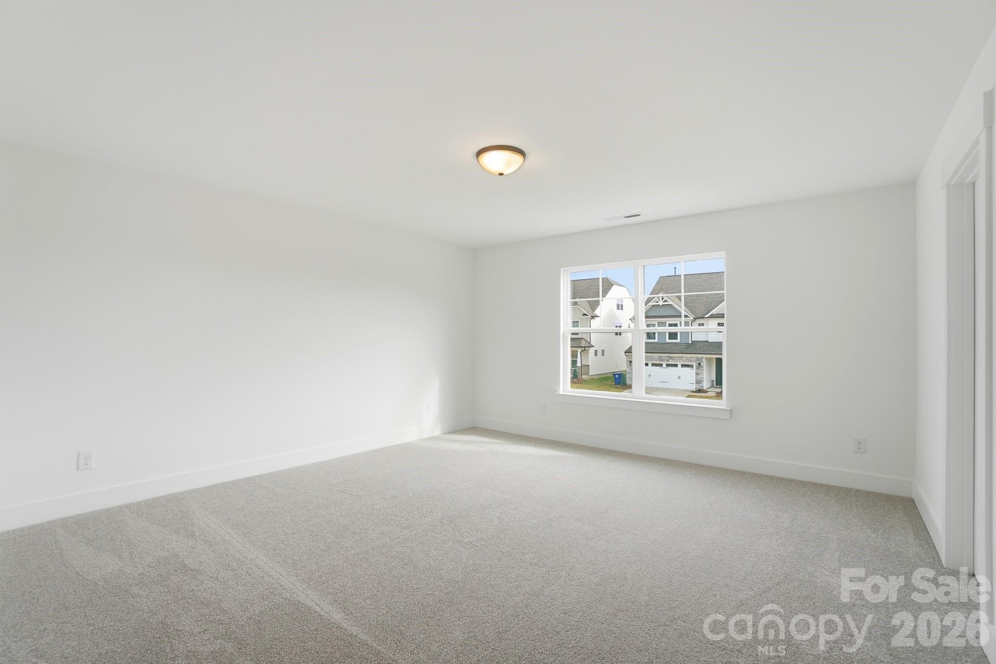 115 Longwood Road Mooresville, NC 28115 - Photo 35 of 43 an empty room with a window