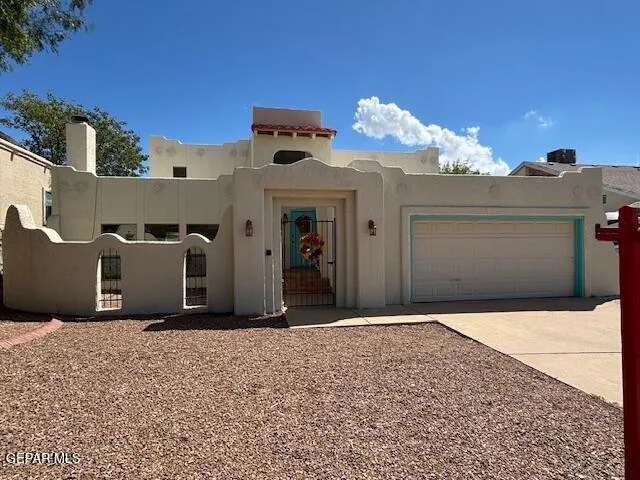 a view of a kitchen with granite countertop a sink and a stove