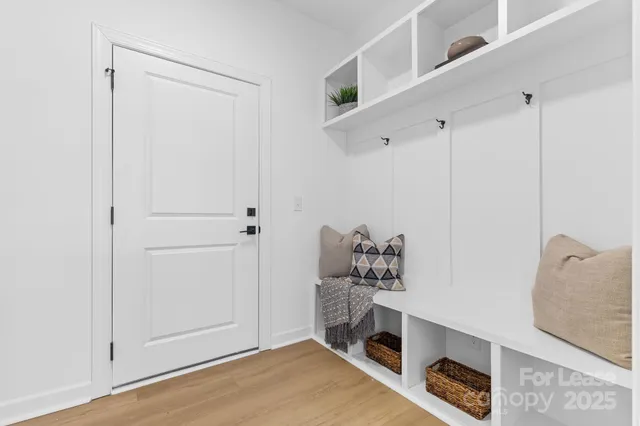 a view of room with hardwood floor