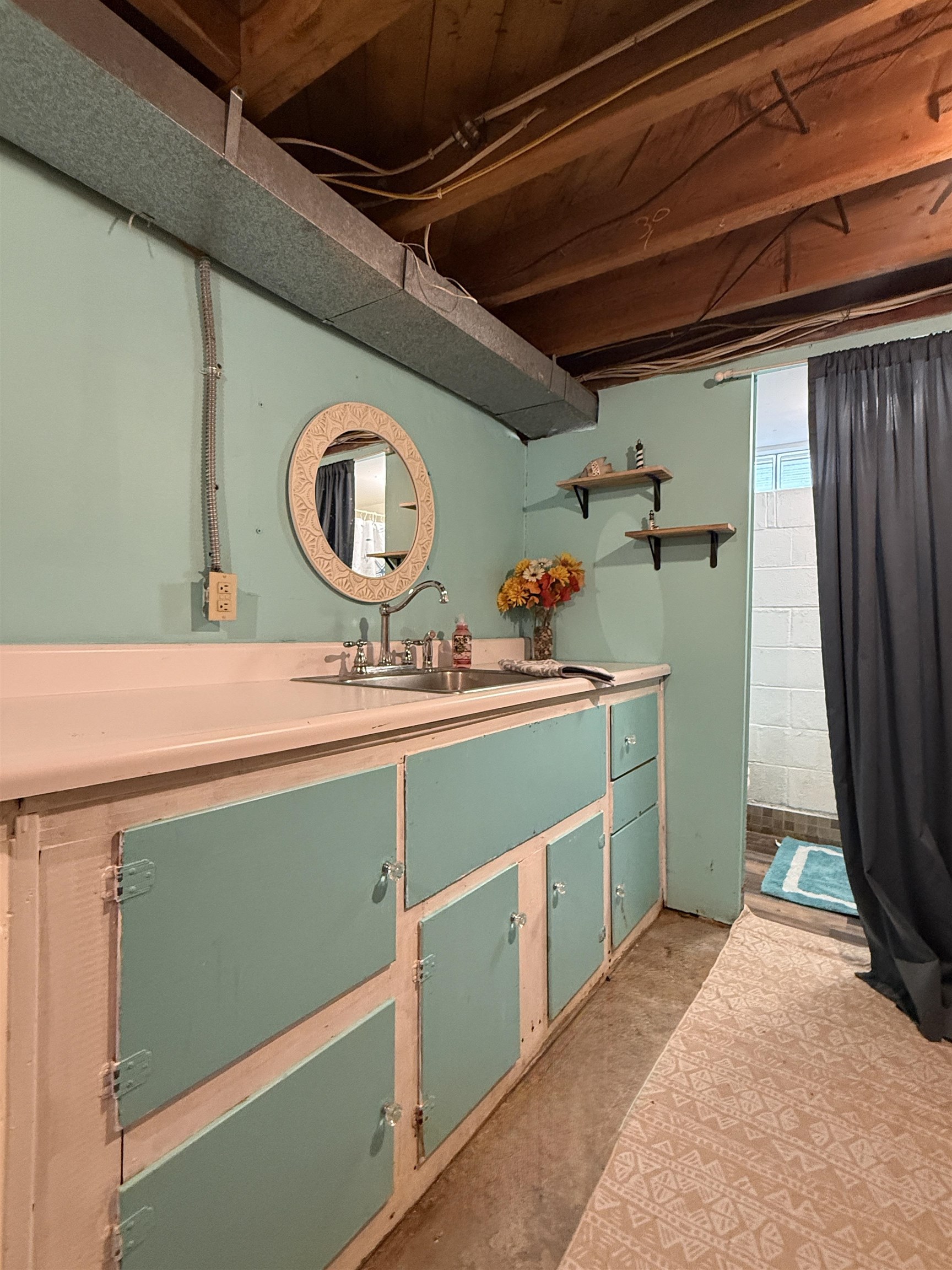 809 16th Street North Virginia, MN 55792 - Photo 37 of 44 Bathroom featuring vanity and concrete floors