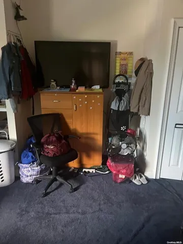 a room with toys and flat screen tv