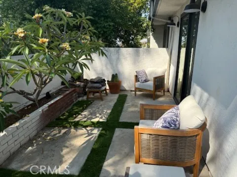 a picture of a couch in the backyard