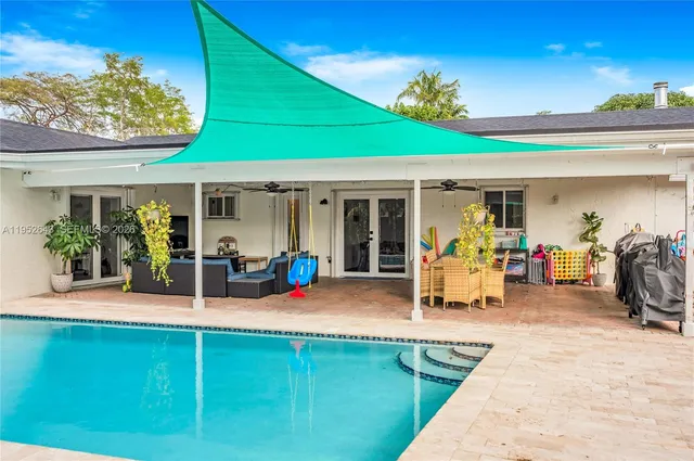 a view of outdoor space yard deck patio and swimming pool