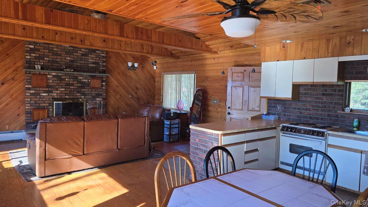 14 Lena Road Monticello, NY 12777 - Photo 13 of 25 a view of a kitchen with furniture and a stove