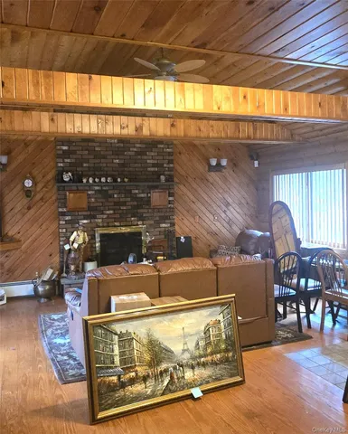 a view of a living room with furniture