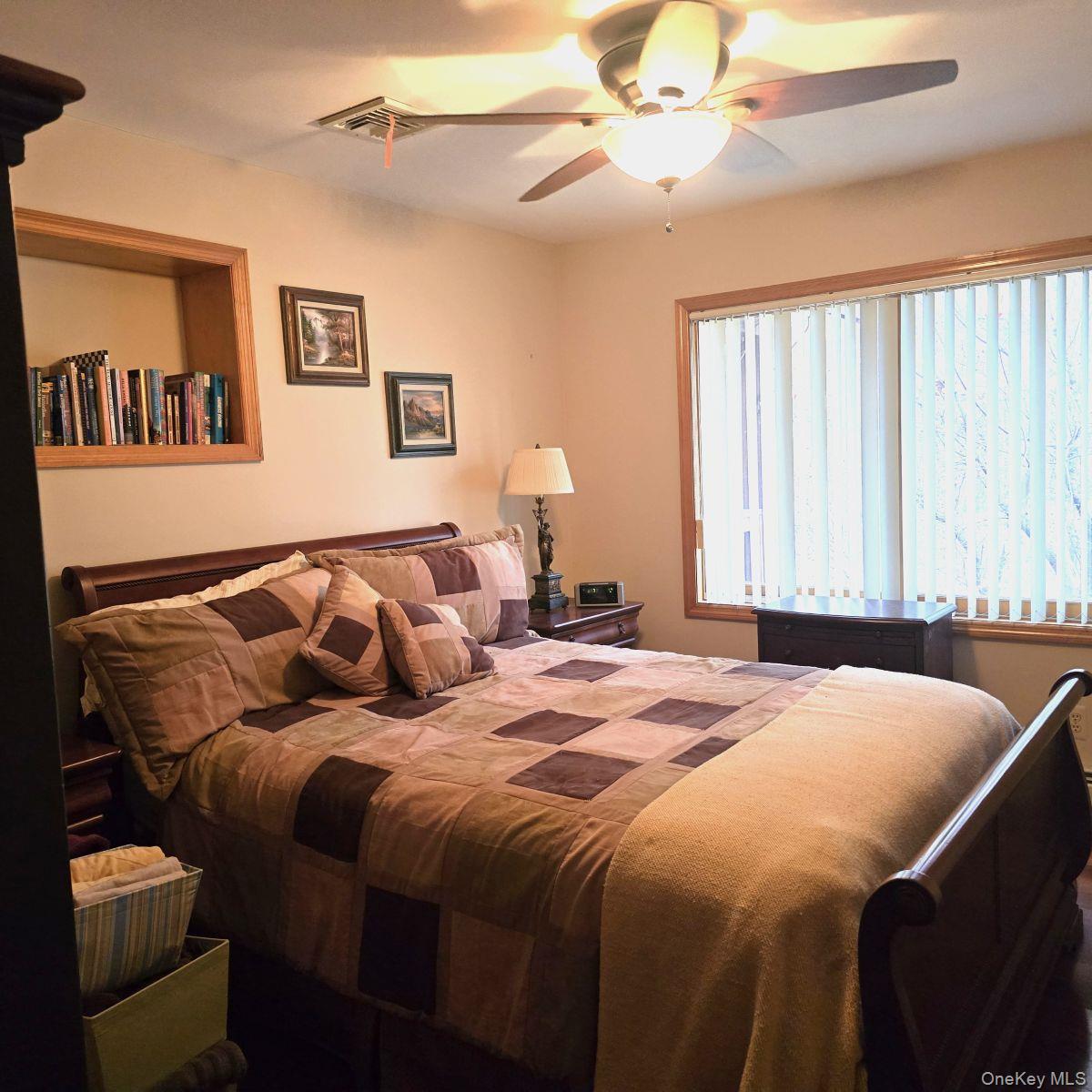 14 Lena Road Monticello, NY 12777 - Photo 16 of 22 a bedroom with a bed and a window