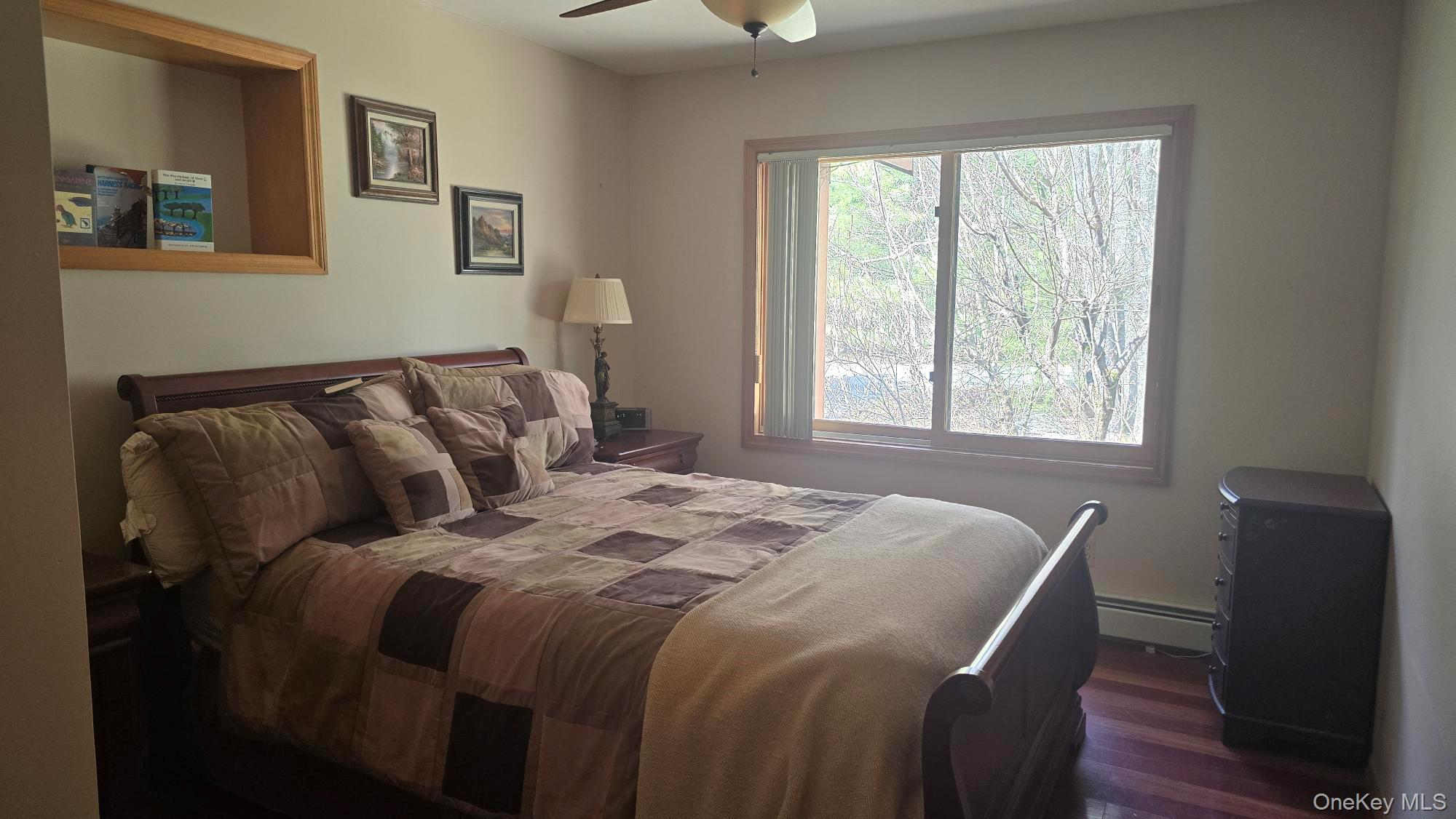 14 Lena Road Monticello, NY 12777 - Photo 19 of 25 a bed sitting in a bedroom next to a window