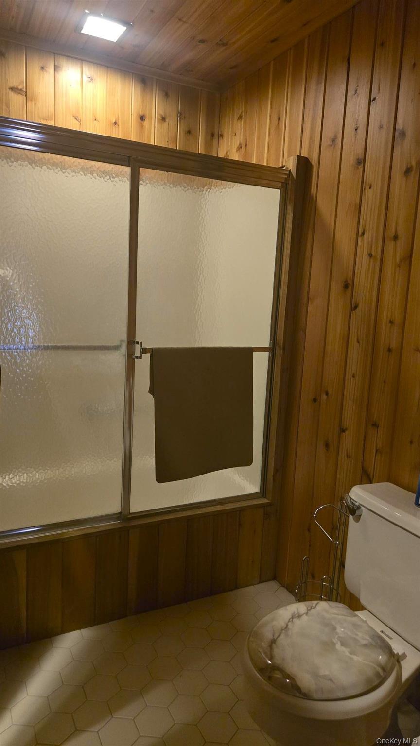 14 Lena Road Monticello, NY 12777 - Photo 20 of 25 a bathroom with a toilet and a shower