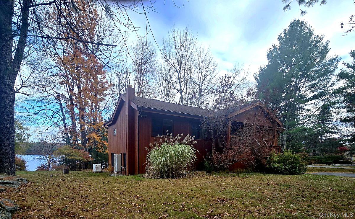 14 Lena Road Monticello, NY 12777 - Photo 2 of 25 a view of a house with a yard and tree