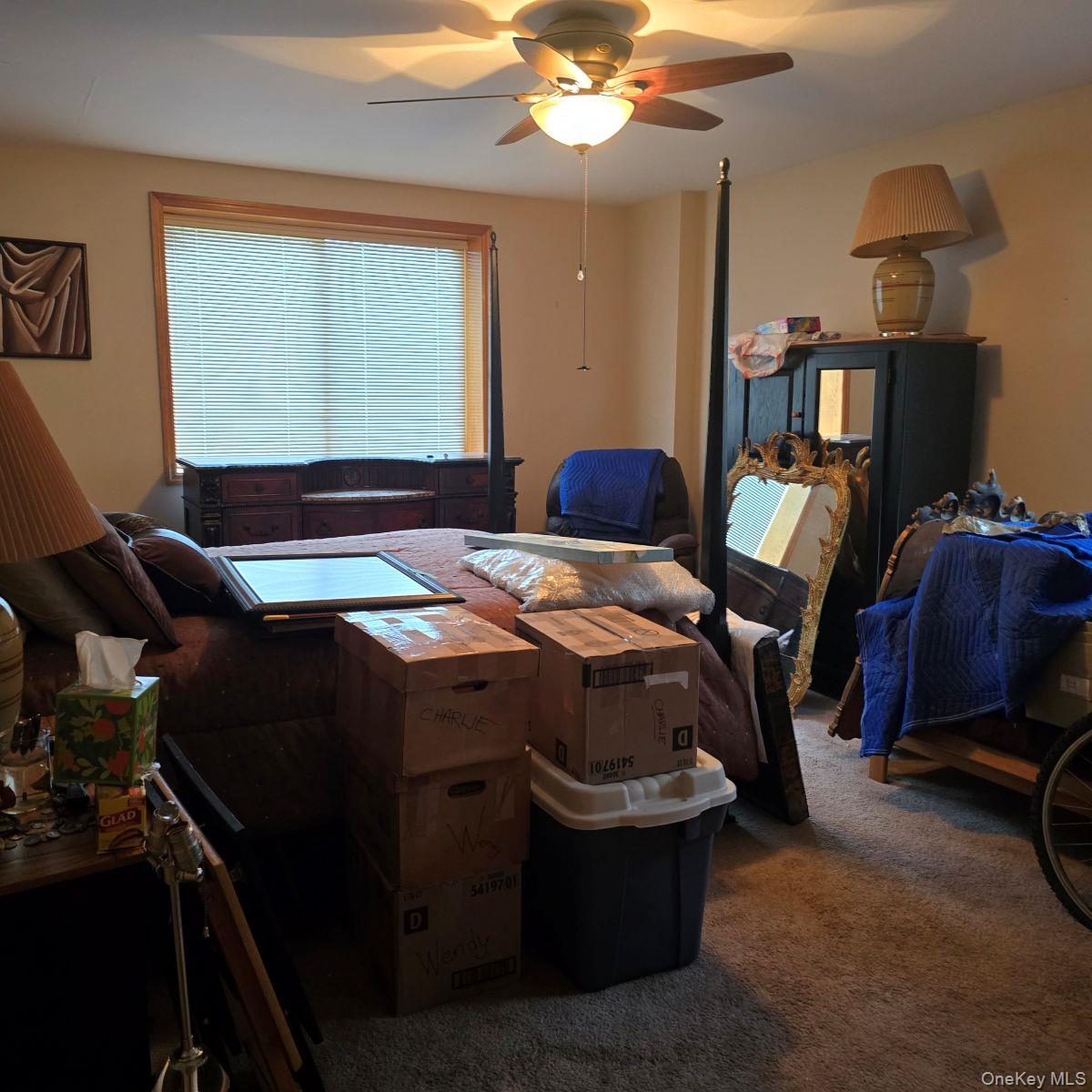 14 Lena Road Monticello, NY 12777 - Photo 21 of 22 a bedroom with bed and window