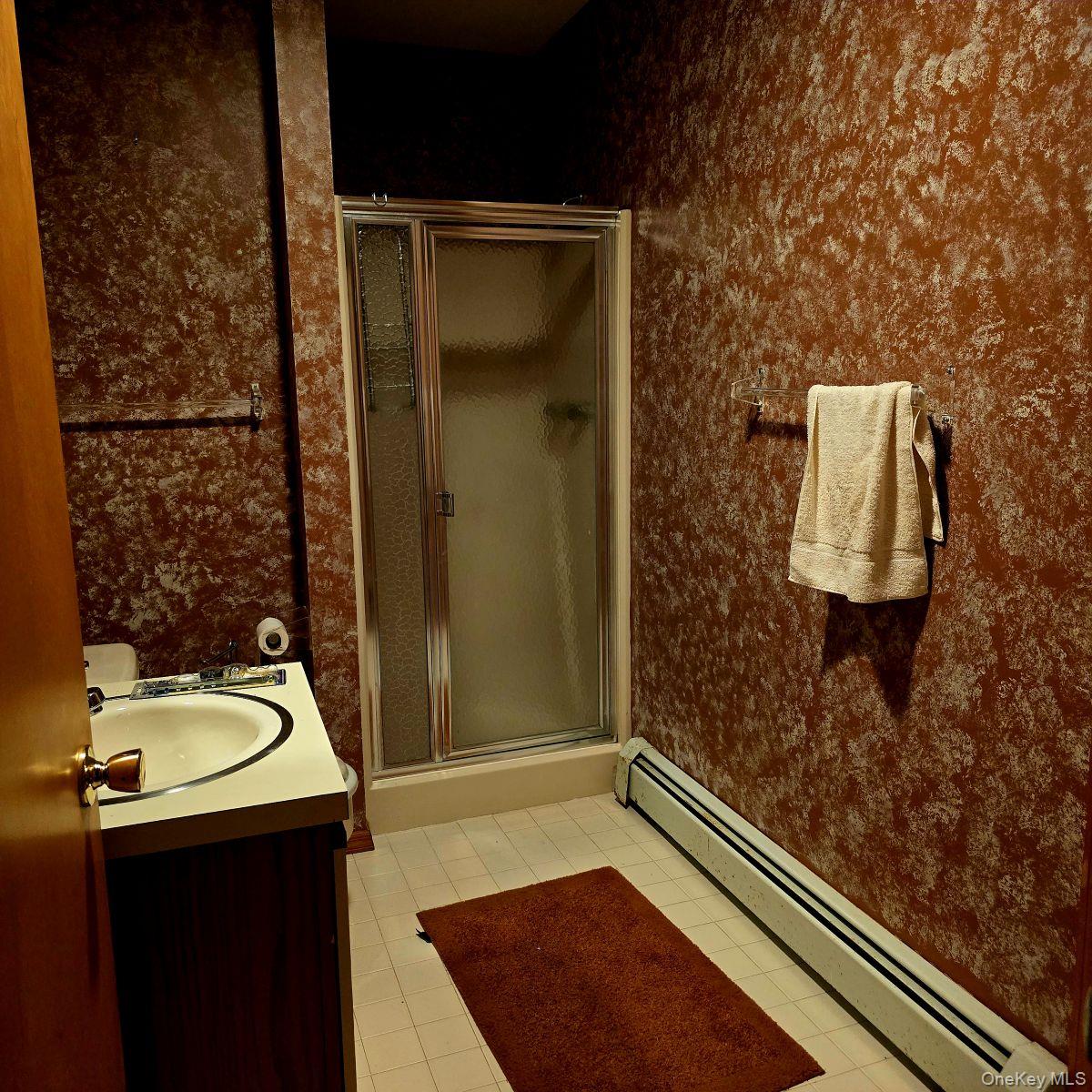 14 Lena Road Monticello, NY 12777 - Photo 22 of 22 a bathroom with a sink and a mirror