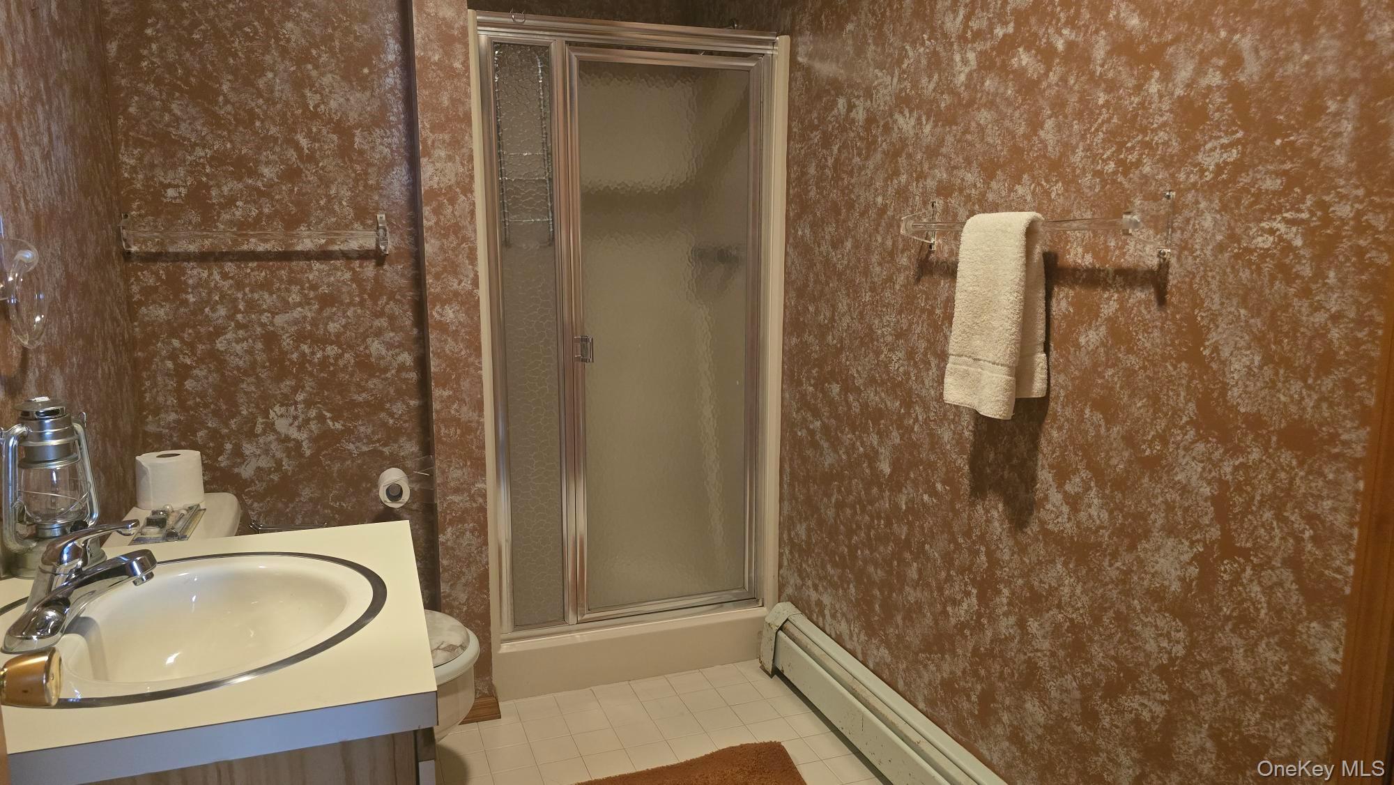 14 Lena Road Monticello, NY 12777 - Photo 25 of 25 a bathroom with a sink and a mirror