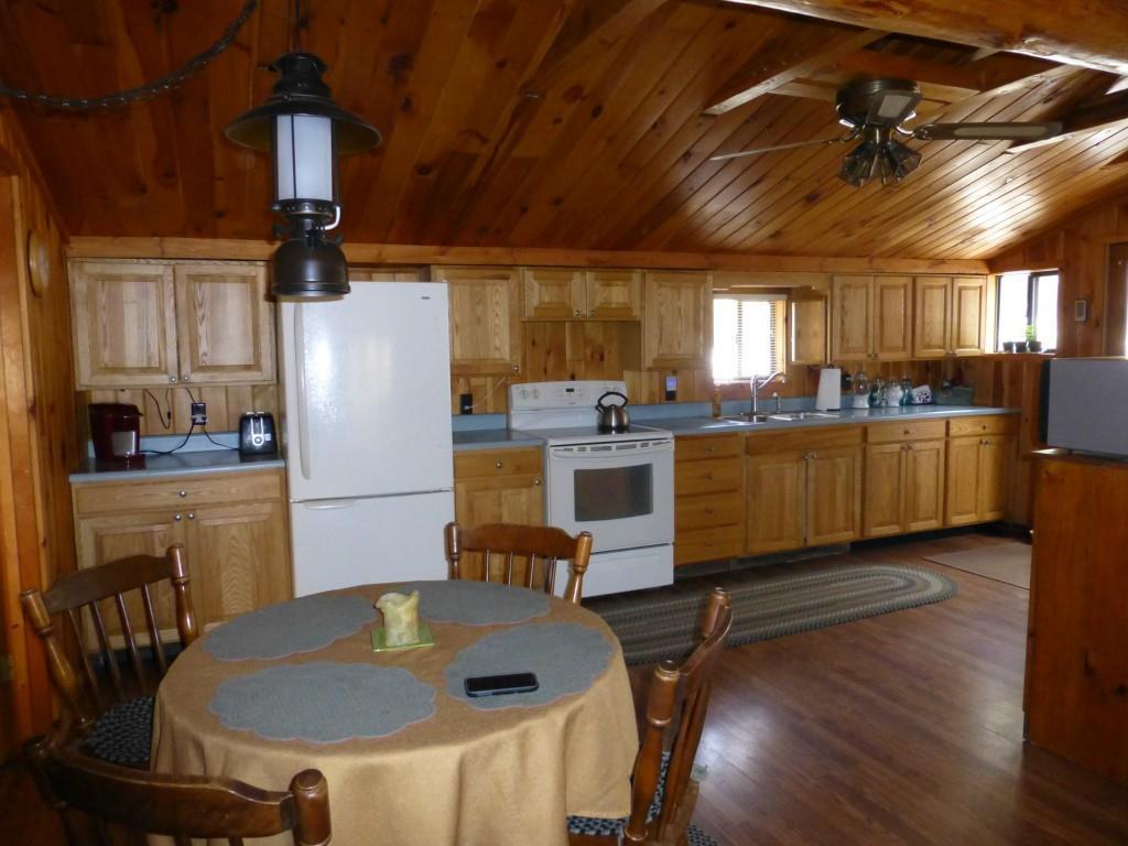 32 Bald Mt Road Oquossoc, ME 04964 - Photo 17 of 35 dining area/kitchen