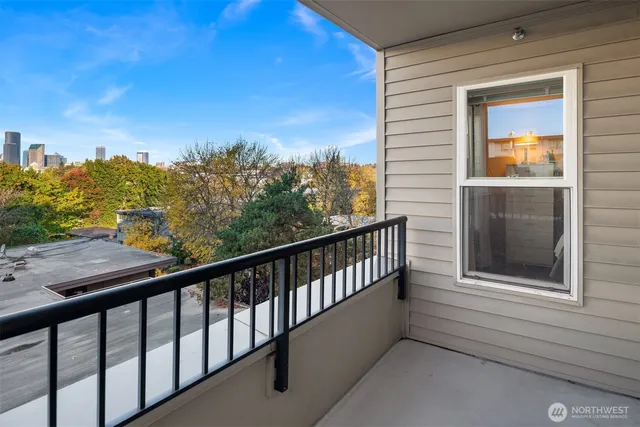 a view of a balcony with an outdoor space