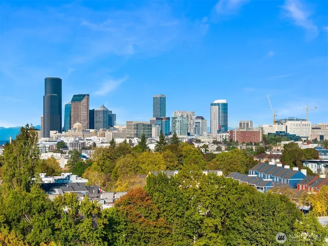 a view of a city with tall buildings