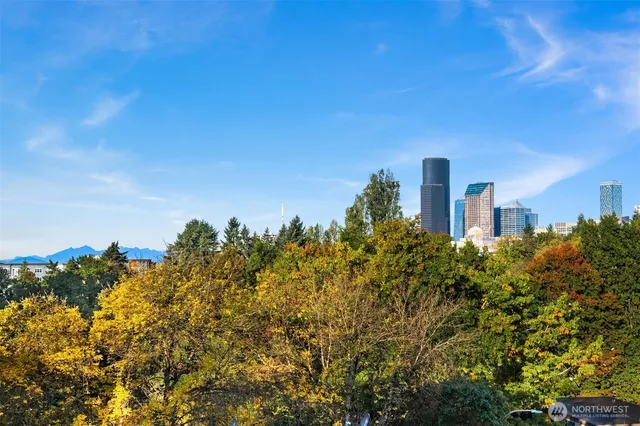 a view of a city with tall buildings