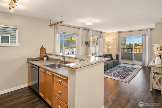a kitchen with a sink stove and refrigerator