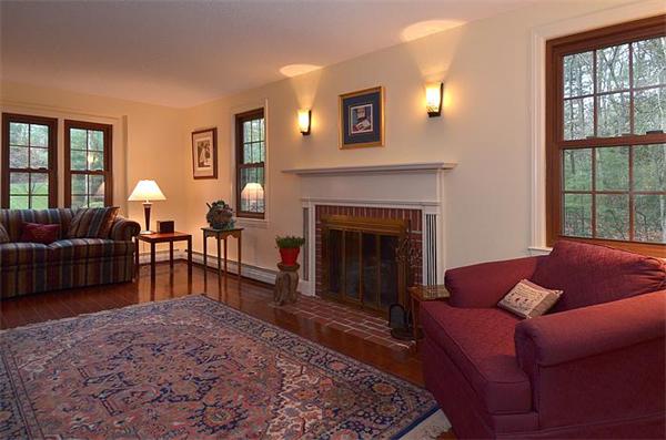 36 Gunnison Road Boxford, MA 01921 - Photo 12 of 24 a living room with furniture and a fireplace