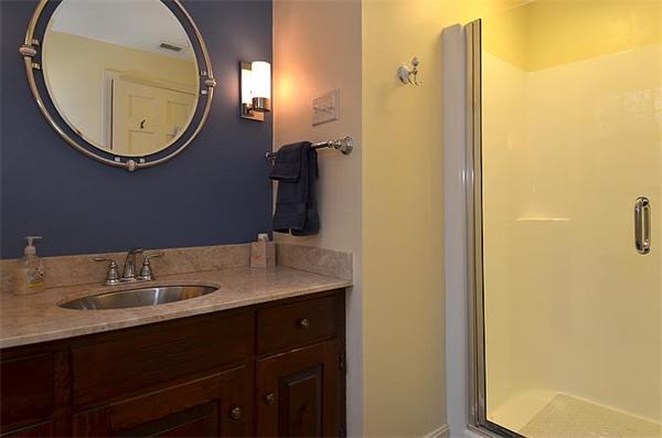36 Gunnison Road Boxford, MA 01921 - Photo 18 of 24 a bathroom with a sink and a mirror