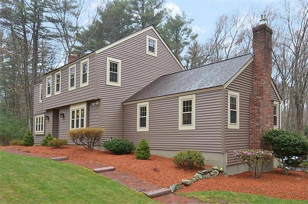 36 Gunnison Road Boxford, MA 01921 - Photo 2 of 24 a front view of a house with garden