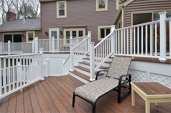 36 Gunnison Road Boxford, MA 01921 - Photo 4 of 24 a view of a wooden chairs on the deck