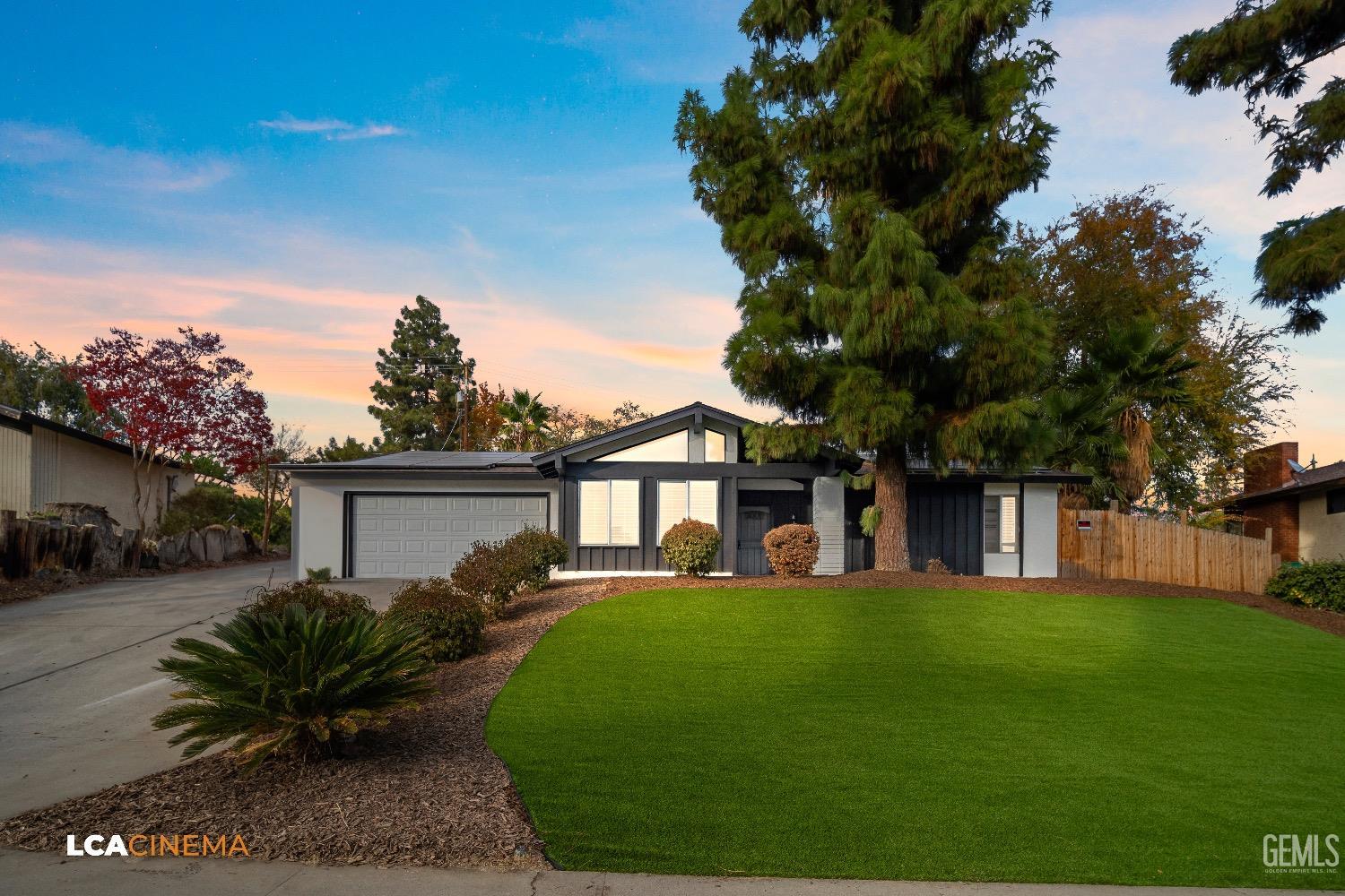 a view of a house with a garden