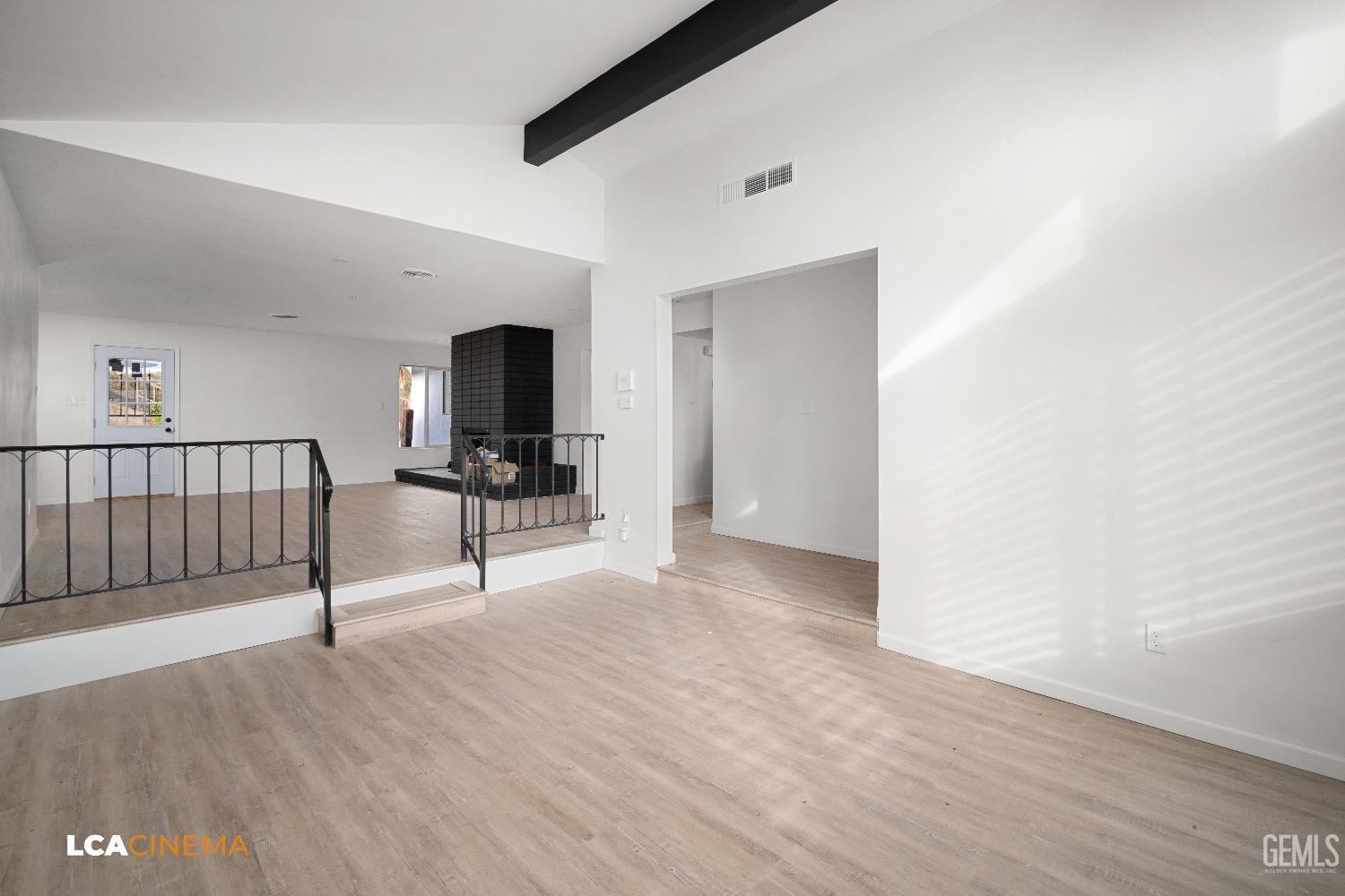 Undisclosed Address Bakersfield, CA 93306 - Photo 16 of 24 a view of a livingroom with wooden floor and furniture