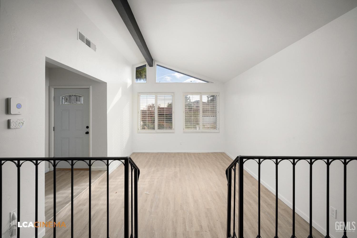 Undisclosed Address Bakersfield, CA 93306 - Photo 17 of 24 a view of staircase with wooden floor and stairs