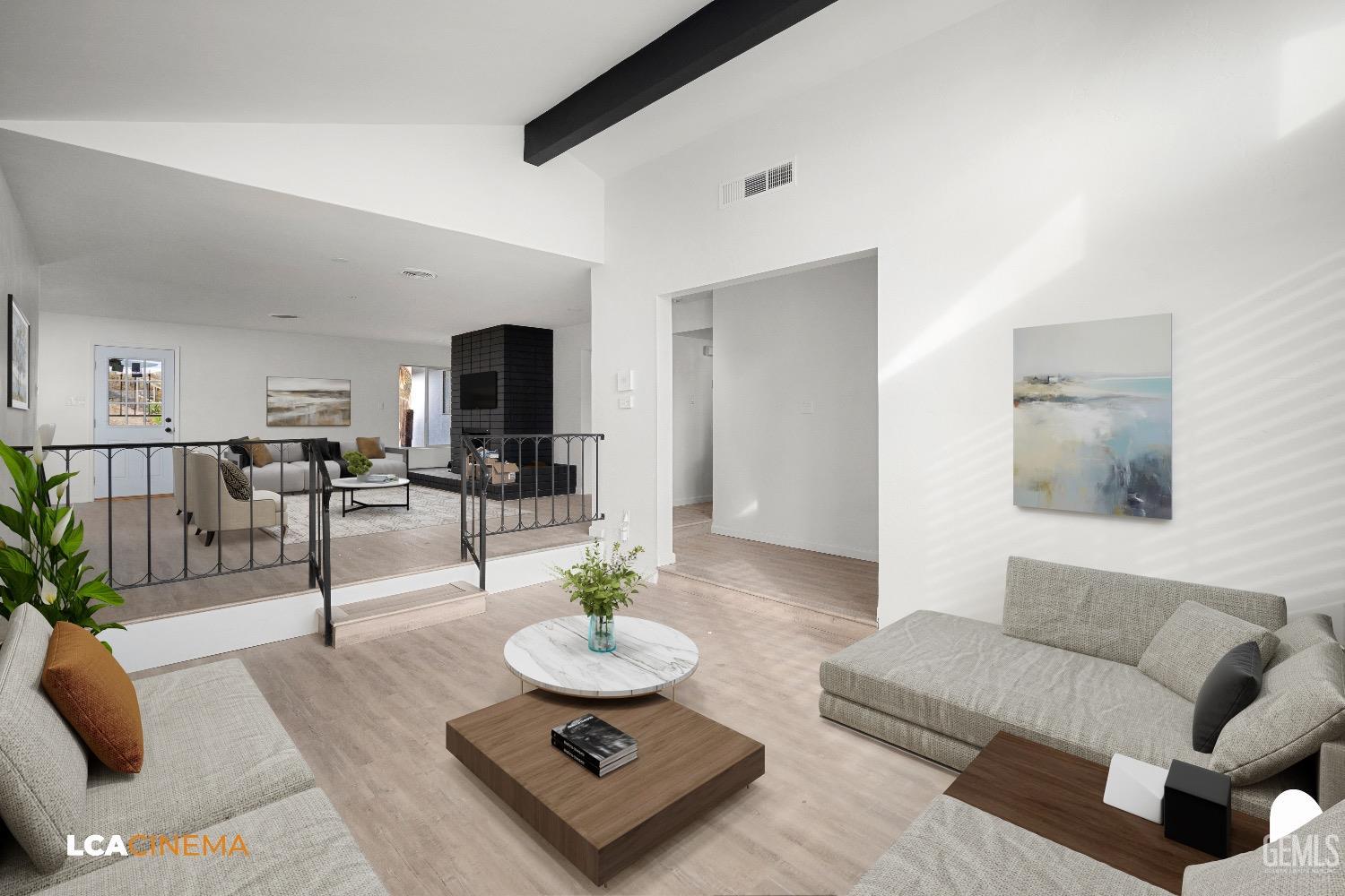 Undisclosed Address Bakersfield, CA 93306 - Photo 5 of 24 a living room with furniture and view of kitchen