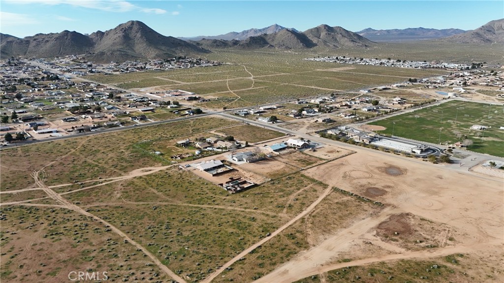 794 Otoe Road Apple Valley, CA 92307 - Photo 6 of 13 an aerial view of residential houses with outdoor space