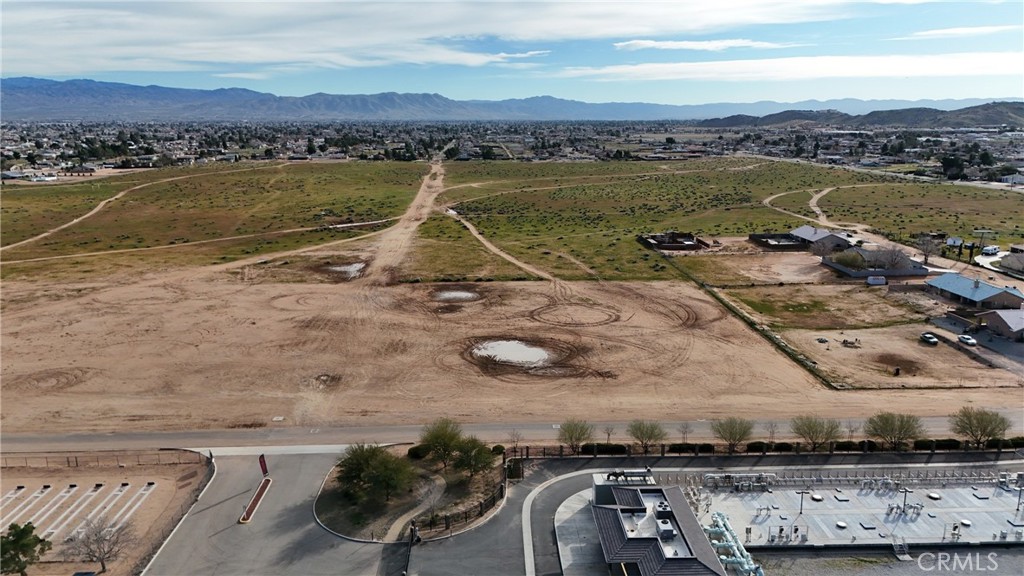 794 Otoe Road Apple Valley, CA 92307 - Photo 9 of 13 an aerial view of a house with a lake view