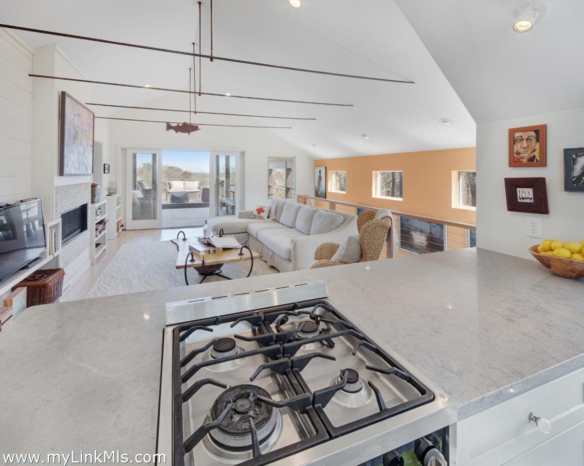 72 Chappaquiddick Avenue Edgartown, MA 02539 - Photo 41 of 63 a living room with furniture and a flat screen tv
