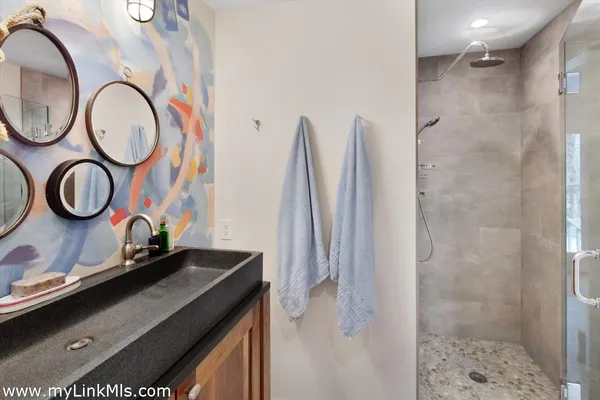 a sign that is sitting on a wall